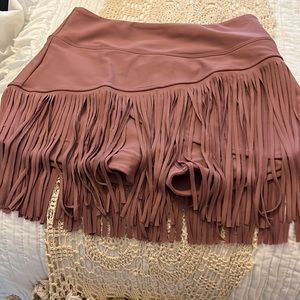 Absolutely adorable fringe tennis skirt.